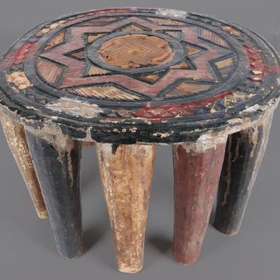Sale Photo Thumbnail #89: NUPE NIGERIAN 9-LEGGED WOODEN PAINTED STOOL EXOTIC