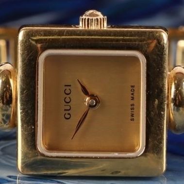 Sale Photo Thumbnail #435: GUCCI 1900 L SWISS MADE SAPPHIRE GOLD TONE WATCH