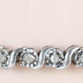 Sale Photo Thumbnail #144: STERLING SILVER DIAMOND LADIES TENNIS BRACELET