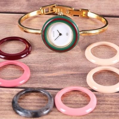 Sale Photo Thumbnail #374: GUCCI 11/12.2 GOLD PLATED LADIES WATCH W/ BEZELS