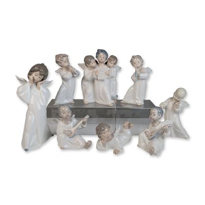 Sale Photo Thumbnail #480: 8pc Lladro Porcelain Musical Angel Figurines Collection