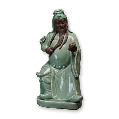 Sale Photo Thumbnail #518: Large Celadon Glazed Porcelain Figure of Seated Immortal