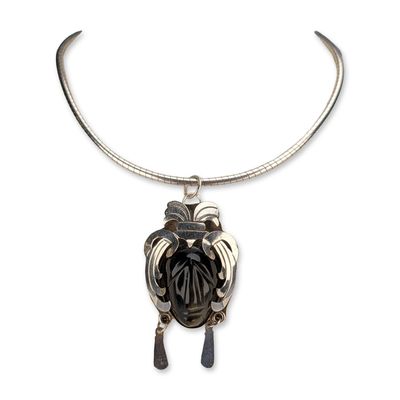 Sale Photo Thumbnail #398: Modern Silver Necklace & Mexican Carved Obsidian Mask Pendant