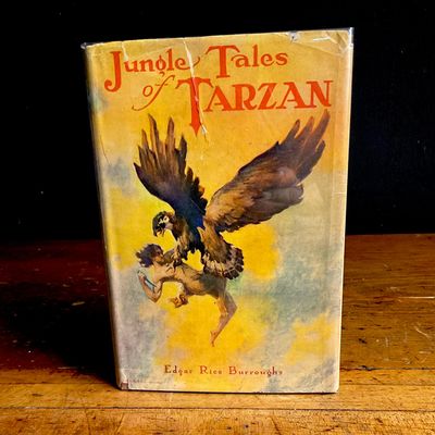 1919. Burroughs, Edgar Rice. Jungle Tales of Tarzan. Grosset & Dunlap. Wartime Edition (DJ)