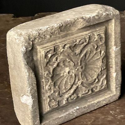 Carved Stone Architectural Relief Fragment with Stylized Floral Motifs