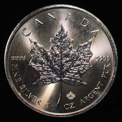 Sale Photo Thumbnail #407: 2022 MAPLE LEAF CANADIAN 1 OZ .999 SILVER ROUND