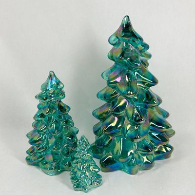 Sale Photo Thumbnail #445: MOSSER TRIO OF IRIDESCENT TEAL GLASS TREES