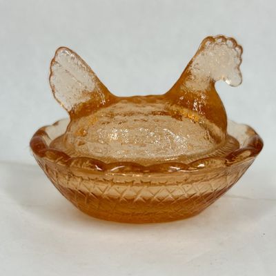 Sale Photo Thumbnail #139: MINIATURE AMBER GLASS HEN ON NEST