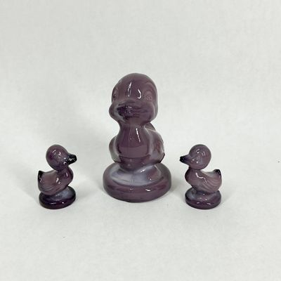 Sale Photo Thumbnail #388: BOYD PURPLE SLAG GLASS DUCK FIGURINES