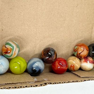 Sale Photo Thumbnail #309: ASSORTED MACHINE-MADE GLASS MARBLES