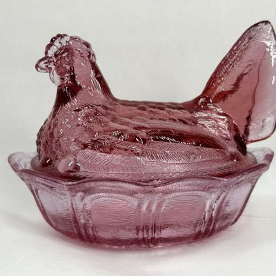 Sale Photo Thumbnail #114: FENTON AMETHYST GLASS HEN ON NEST