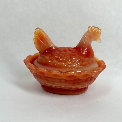 Sale Photo Thumbnail #155: BOYD ORANGE SLAG GLASS HEN ON NEST