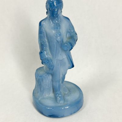 Sale Photo Thumbnail #408: BOYD BLUE SLAG GLASS COLONIAL MAN FIGURINE