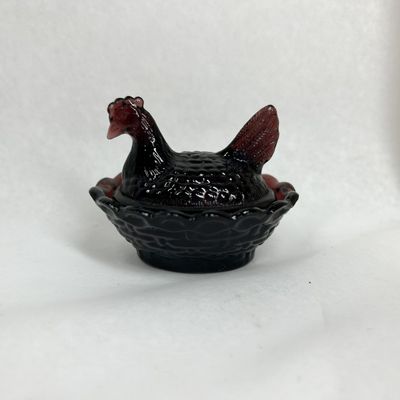 Sale Photo Thumbnail #153: BOYD DARK AMETHYST GLASS HEN ON NEST