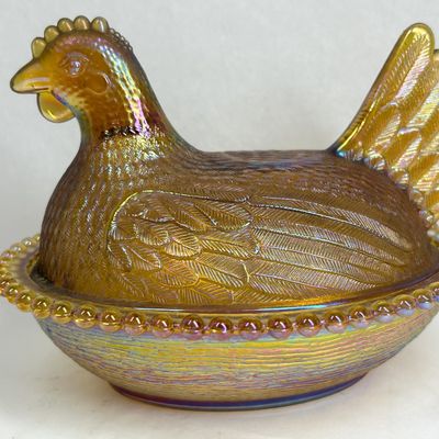 Sale Photo Thumbnail #173: INDIANA AMBER IRIDESCENT CARNIVAL GLASS HEN ON NEST