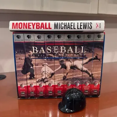 Baseball: Ken Burns documentary set, Moneyball book & bottle opener