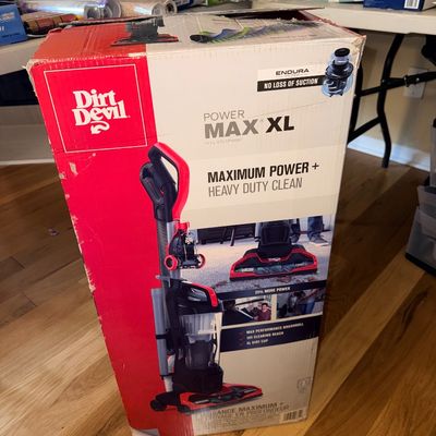 Dirt Devil Power Max XL upright vacuum cleaner, packaged in its original retail box showing light wear.