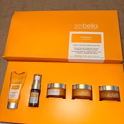 Sei Bella Vitamin C Skin Defense travel-size skincare collection set in its original orange box.
