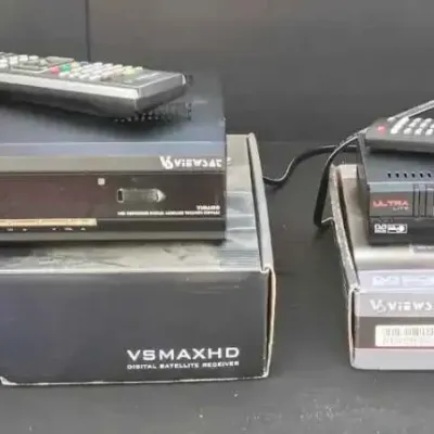 Sale Photo Thumbnail #77: Two Viewsat digital satellite receivers, including a VSMAXHD and a Ultra Lite model, both with remotes and original boxes.