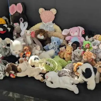 Sale Photo Thumbnail #20: Large collection of vintage Ty Beanie Babies and other plush toys, featuring various animals including bears, rabbits, dogs, and cats, mostly from the late 1990s and early 2000s.