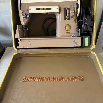 Sale Photo Thumbnail #5: Vintage Singer 301A sewing machine in a tan and cream finish, housed inside its original yellow carrying case with foot pedal and accessories.
