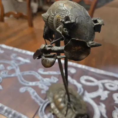 Sale Photo Thumbnail #11: Vintage Asian bronze sculpture depicting a crane standing on a turtle, featuring detailed feather and shell textures.