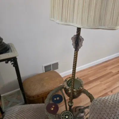 Sale Photo Thumbnail #54: Vintage floor lamp with an integrated glass-top accent table, featuring a twisted brass pole and a pleated fabric shade.