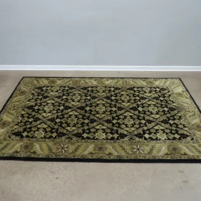 Sale Photo Thumbnail #30: Traditional area rug featuring an intricate floral and geometric pattern in shades of olive green, beige, and black.