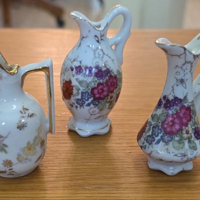 Sale Photo Thumbnail #117: Set of Three Miniature Porcelain Floral Pitchers