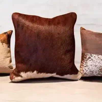 Lot 3: Hide & Lumbar Designer Set… High-End Leather Pillows!