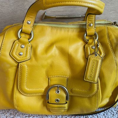Sale Photo Thumbnail #338: Sunny yellow purse 
Does have some markings on inside and bottom