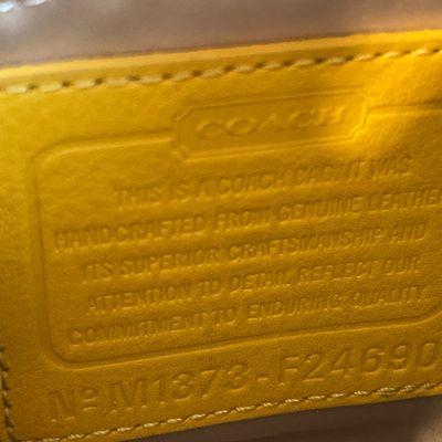 Sale Photo Thumbnail #340: Sunny yellow purse 
Does have some markings on inside and bottom