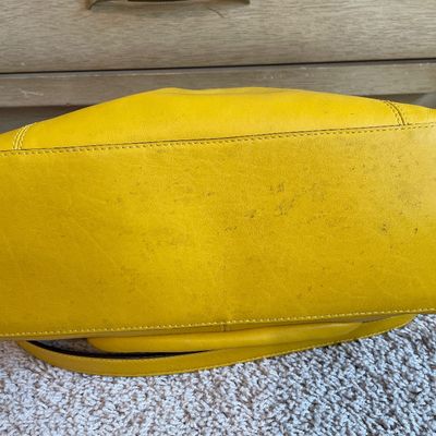 Sale Photo Thumbnail #341: Sunny yellow purse 
Does have some markings on inside and bottom