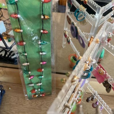 Sale Photo Thumbnail #256: Earrings and holder