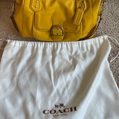 Sale Photo Thumbnail #337: Sunny yellow purse 
Does have some markings on inside and bottom