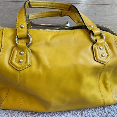 Sale Photo Thumbnail #339: Sunny yellow purse 
Does have some markings on inside and bottom
