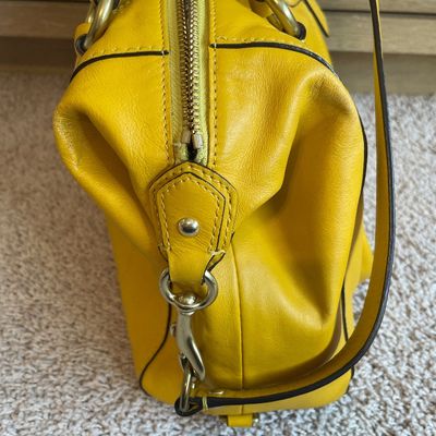 Sale Photo Thumbnail #343: Sunny yellow purse 
Does have some markings on inside and bottom