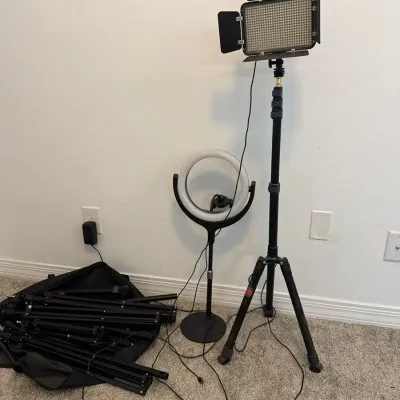 A Couple Lights and Several Tripods