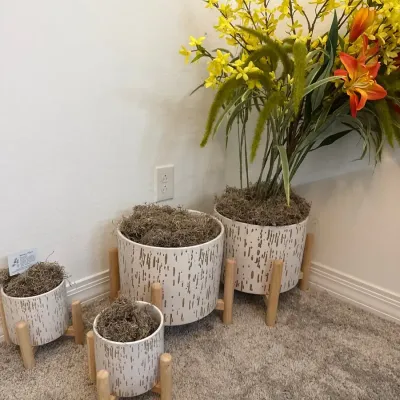 Four Matching Pots with Stands