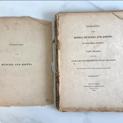 Sale Photo Thumbnail #194: Rare 1815 first American edition of "Engravings of the Bones, Muscles and Joints" by surgeon John Bell, published by Anthony Finley in Philadelphia, showing significant age wear and detached cover page.
