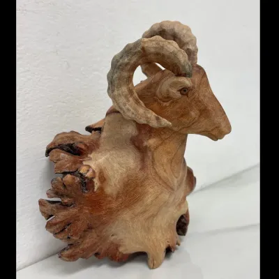 Sale Photo Thumbnail #407: Lot 9105 chinaberry burl hand carved bighorn sheep ram