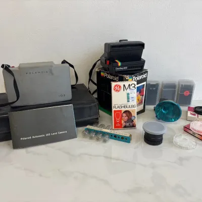 Sale Photo Thumbnail #22: Lot 8699 vintage polaroid cameras and accessories