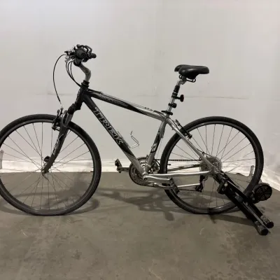 Sale Photo Thumbnail #457: Lot 50457 trek 7200 multitrack bicycle w bike trainer stand
