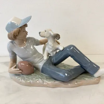 Sale Photo Thumbnail #224: Lot 8913 nao by lladro boy with dog porcelain figurine