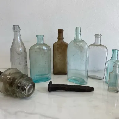 Sale Photo Thumbnail #150: Lot 8832 vintage colored glass bottles glass insulator railroad spike