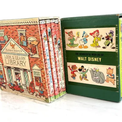 Sale Photo Thumbnail #192: Vintage children's book box sets, featuring Richard Scarry's Look & Learn Library and The Wonderful Worlds of Walt Disney, showing some wear on the slipcases.