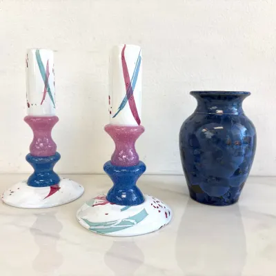 Sale Photo Thumbnail #63: Pair of Memphis-style ceramic candlesticks with colorful geometric splatters and a small blue crystalline glaze studio pottery vase.