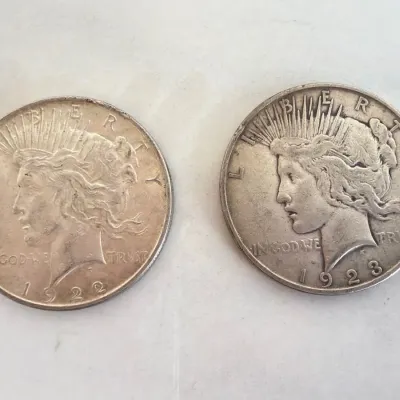 Sale Photo Thumbnail #324: Lot 9020 u s coins 1922 1923 peace silver dollars