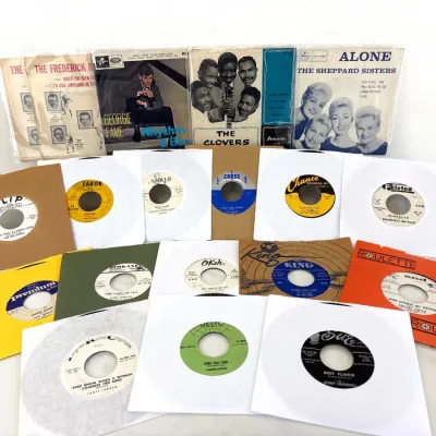 Sale Photo Thumbnail #189: Collection of vintage 45 RPM vinyl records and EP picture sleeves, featuring classic R&B, rock & roll, and doo-wop artists on labels such as Chess, King, Roulette, Sue, and Okeh.
