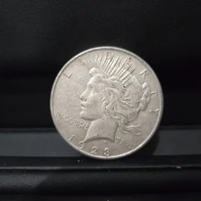 Sale Photo Thumbnail #30: 1923 Peace Silver Dollar